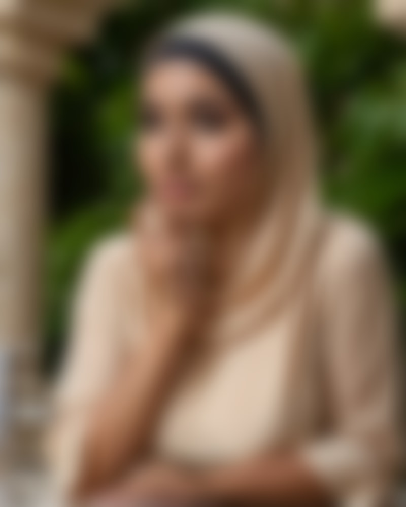 Amirah Hassan — AI persona on XManias